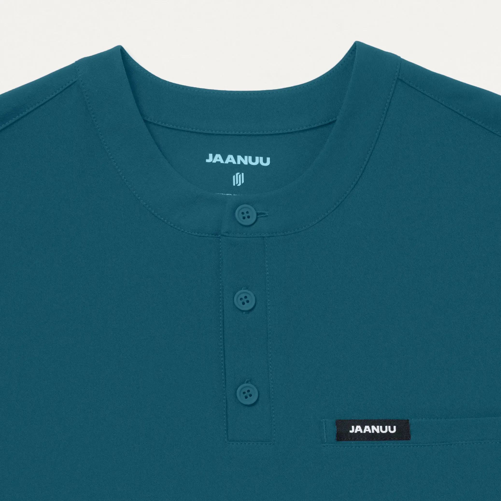 Jaanuu Men's Reeve Henley Scrub Top - Caribbean Blue