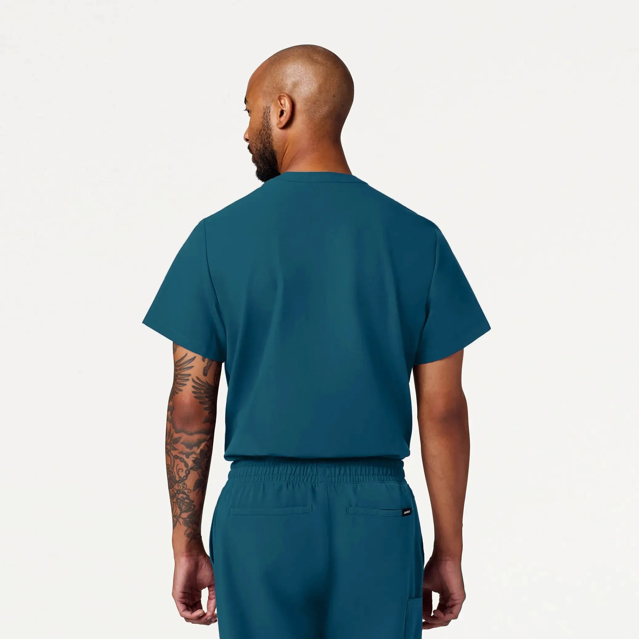 Jaanuu Men's Reeve Henley Scrub Top - Caribbean Blue